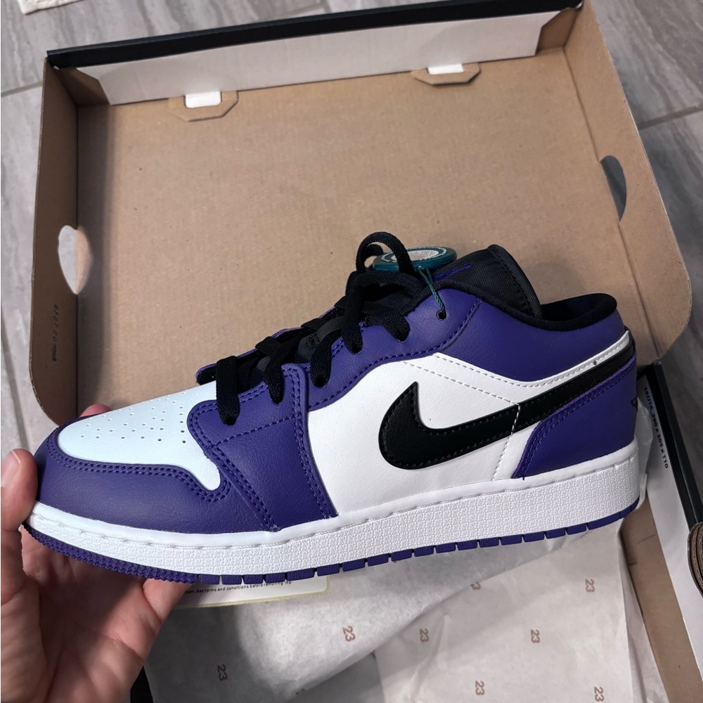 Purple and black jordans. New in box.